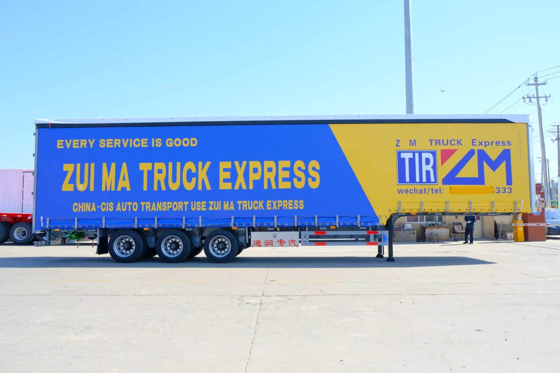 Вид сбоку на полуприцеп ZM CARGO